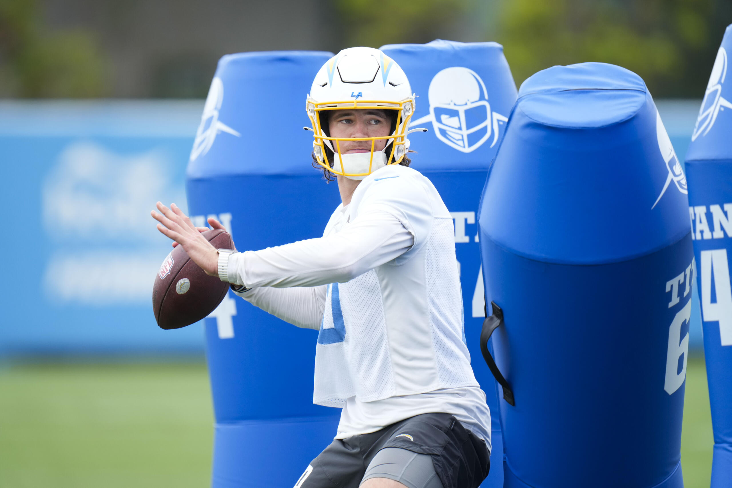 Los Angeles Chargers quarterback Justin Herbert (10) runs a drill during the NFL football team's camp in Costa Mesa, Calif., Tuesday, June 13, 2023. (AP Photo/Jae C.
