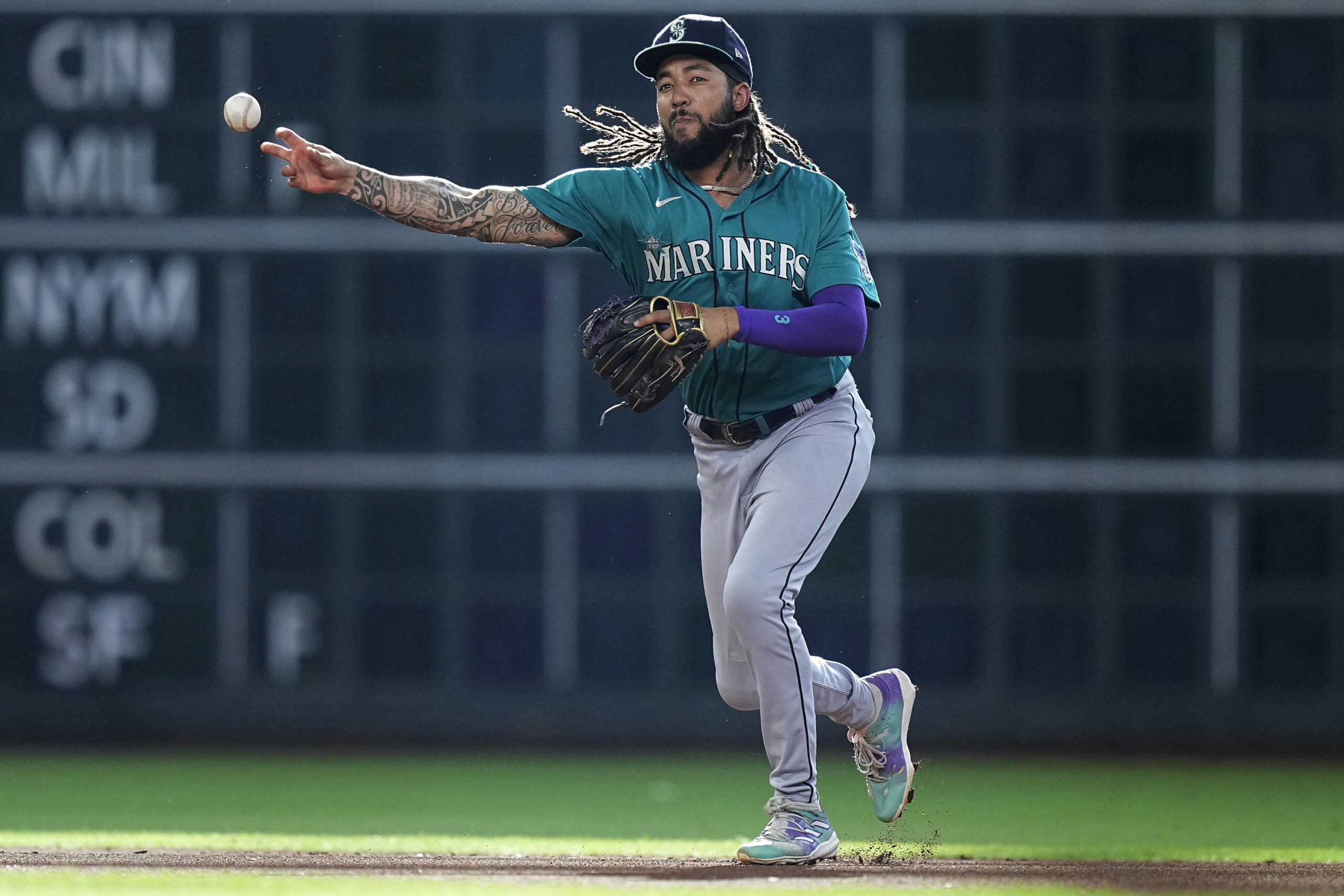 Seattle Mariners shortstop J.P. Crawford throws out Houston Astros' Mauricio Dubon at first during the first inning of a baseball game Saturday, July 8, 2023, in Houston. (AP Photo/Kevin M.