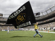 Colorado is leaving the Pac-12 to return to the conference the Buffaloes jilted a dozen years ago, and the Big 12 celebrated the reunion with a two-word statement released through Commissioner Brett Yomark: “They’re back.” (AP Photo/David Zalubowski, File)