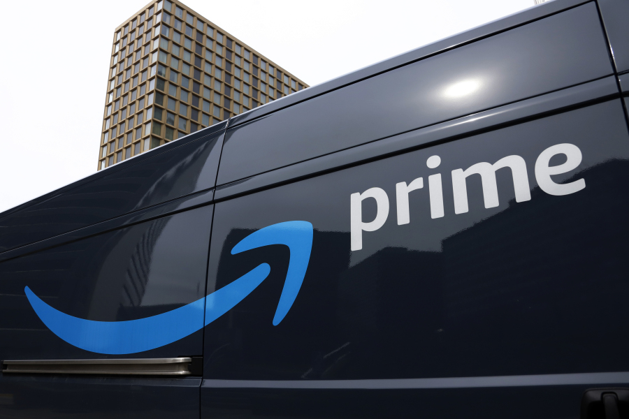 FILE - An Amazon Prime delivery vehicle is seen in downtown Pittsburgh on March 18, 2020. Amazon said Thursday, July 13, 2023 it had its biggest Prime day event ever this year. The e-commerce company did not reveal how much money it earned during the two-day sales event, which took place on Tuesday and Wednesday. But the company touted 375 million items that it says were purchased worldwide by Prime members, who pay $14.99 per month or $139 per year for different perks including faster shipping. (AP Photo/Gene J.