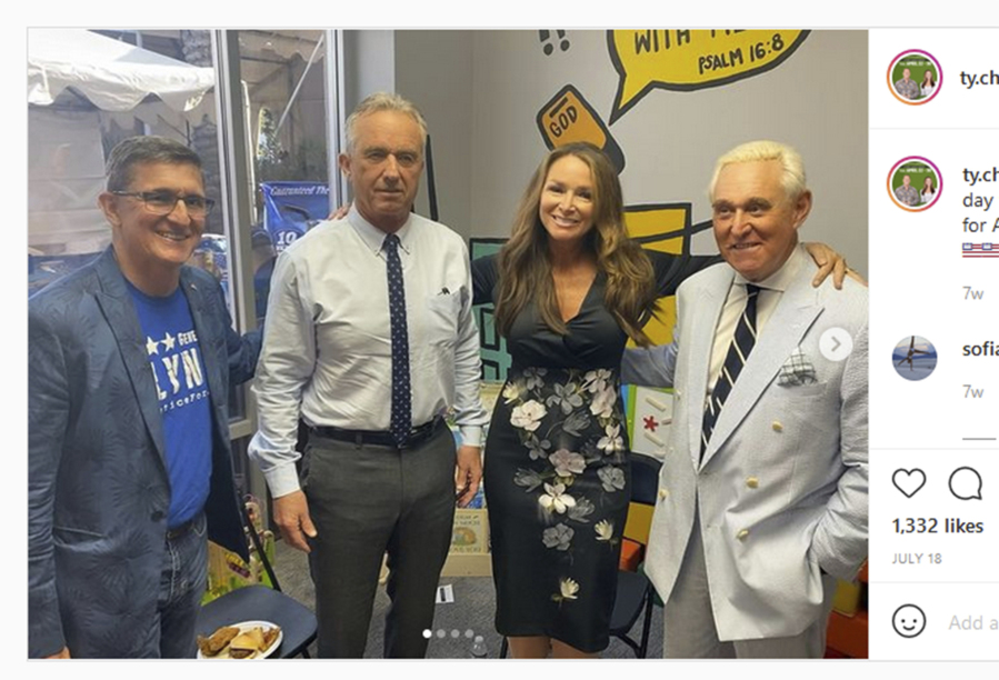 FILE - This screenshot of a photo posted on Instagram on July 18, 2021, shows Robert F. Kennedy, Jr., second from left, with former National Security Adviser Michael Flynn, left, anti-vaccine business owner Charlene Bollinger, and former President Donald Trump ally Roger Stone, right. Kennedy, now running for president as a Democrat, has portrayed himself as a true Democrat inheriting the mantle of the Kennedy family, yet he has associated with influential people on the far right.