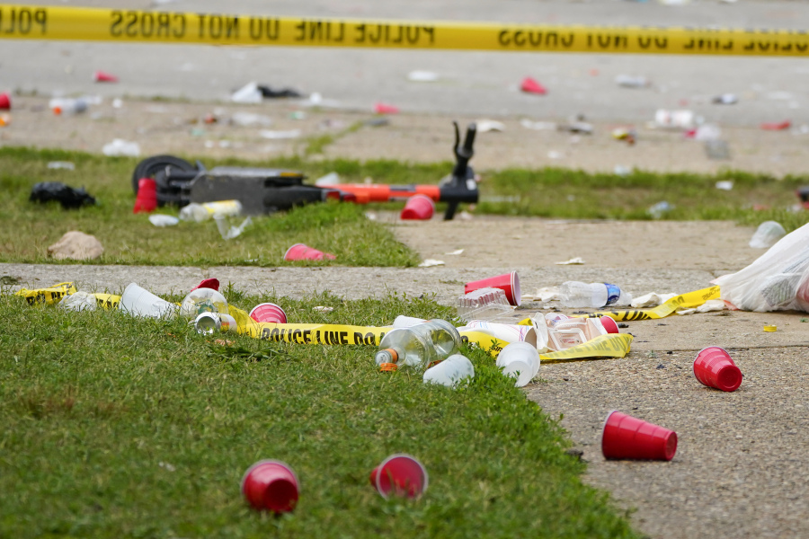 FILE -  Party debris is seen in the area of a mass shooting incident in the Southern District of Baltimore, Sunday, July 2, 2023. Baltimore police have arrested a 17-year-old boy who they believe was involved in a mass shooting at a block party over the holiday weekend that killed two people and wounded 28 others, officials announced Friday, July 7, 2023.
