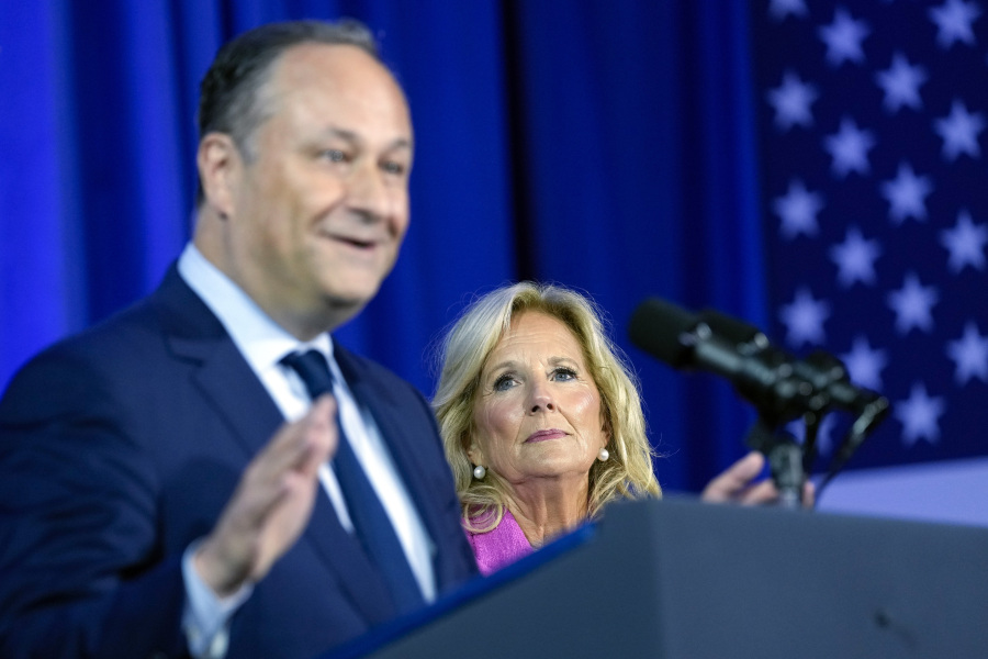 First lady Jill Biden listens as Doug Emhoff, husband of Vice President Kamala Harris, speaks during an event about reproductive rights in Washington, Friday, June 23, 2023.
