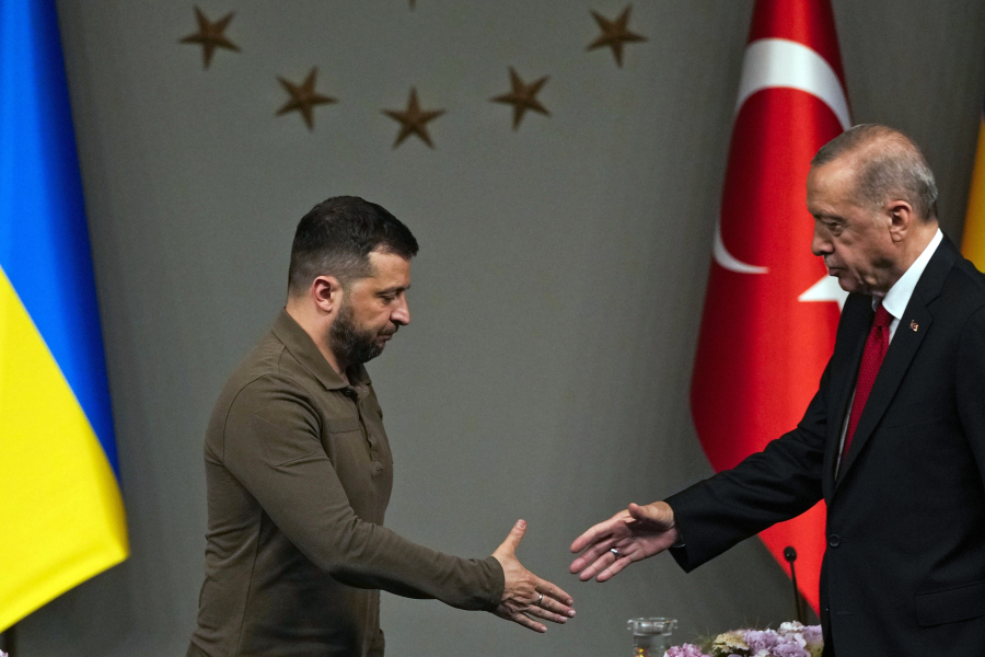 FILE - Turkey's President Recep Tayyip Erdogan, right, shakes hands with Ukraine's President Volodymyr Zelenskyy after a joint news conference following their meeting in Istanbul, Turkey, early Saturday, July 8, 2023.