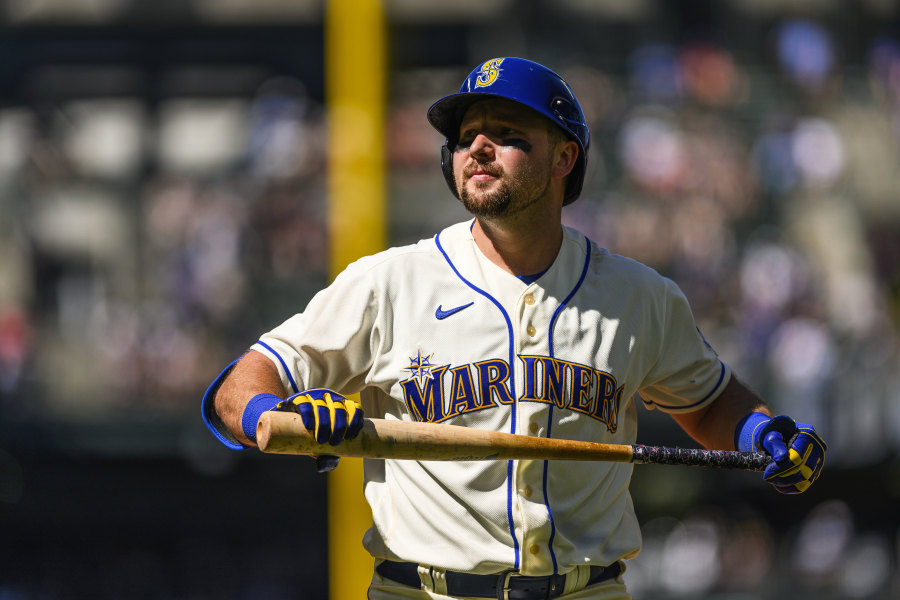 Seattle Mariners' Cal Raleigh reacts after striking out to Toronto Blue Jays relief pitcher Trevor Richards during the eighth inning of a baseball game, Sunday, July 23, 2023, in Seattle.