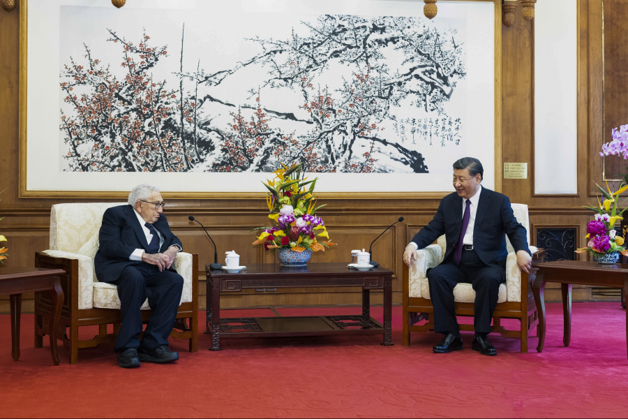 In this photo released by Xinhua News Agency, Chinese President Xi Jinping, right, talks to former U.S. Secretary of State Henry Kissinger during a meeting at the Diaoyutai State Guesthouse in Beijing, Thursday, July 20, 2023.