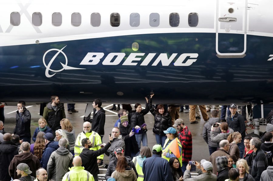 FILE- In this Feb. 5, 2018, file photo a Boeing 737 MAX 7 is displayed during a debut for employees and media of the new jet in Renton, Wash. The Boeing Company reports earnings on Wednesday, July 26, 2023.