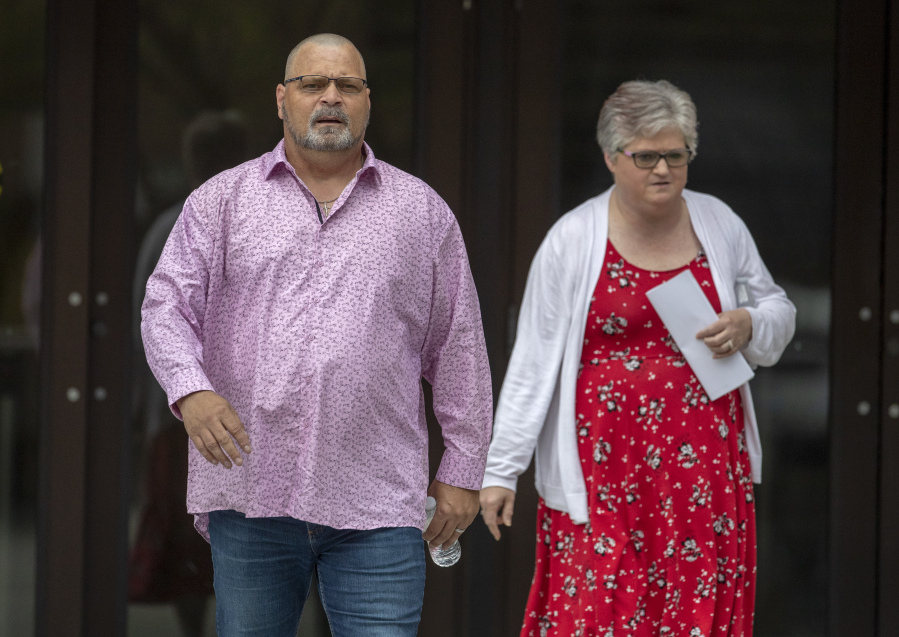 Dean and Hilda Reckard, brother and sister-in-law of Margie Reckard, who died in the Walmart mass shooting, exit the federal court at the end of the second day of the sentencing hearing for perpetrator Patrick Crusius in El Paso, Texas, Thursday, July 6, 2023. Nearly four years after a white gunman killed 23 people at a Walmart in El Paso in a racist attack that targeted Hispanic shoppers, relatives of the victims are packing a courtroom near the U.S.-Mexico border this week to see Crusius punished for one of the nation's worst mass shootings.