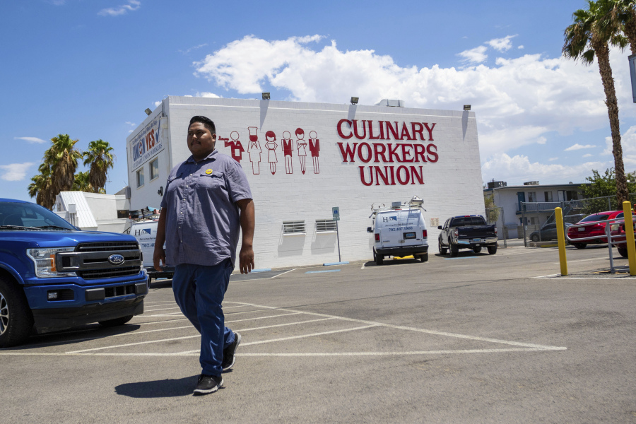 Alberto Rodriguez, 24, walks to his car outside the Culinary Union on Wednesday, July 26, 2023, in Las Vegas. Joe Biden, America's oldest president, will need the support of young voters as he seeks reelection in 2024. Voters like Rodriguez were a key piece of Biden's winning 2020 coalition, which included majorities of young people as well as college graduates, women, urban and suburban voters and Black Americans. Maintaining their support will be critical in closely contested states such as Nevada, where even small declines could prove consequential to Biden's reelection bid.