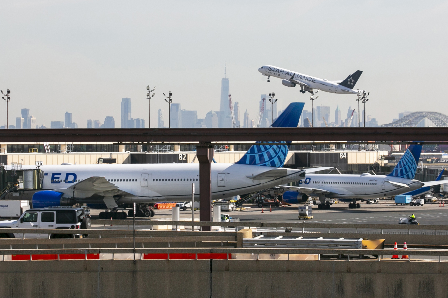 FILE A plane takes off from Newark Liberty International Airport in Newark, New Jersey, on Monday, February 27, 2023, with One World Trade Center and the lower Manhattan skyline visible in the background. The Federal Aviation Administration, which was heavily criticized for the way it approved the Boeing 737 Max before two deadly crashes, said Wednesday, July 26, 2023, that it is more clearly explaining the kind of critical safety information that must be disclosed to the agency.