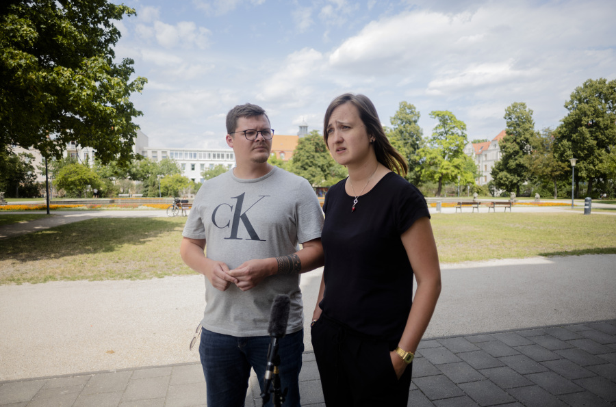 Teachers Laura Nickel, right, and Max Teske speak to The Associated Press during an interview in Cottbus, Germany, Wednesday, July 19, 2023. Two teachers in eastern Germany tried to counter the far-right activities of students at their small town high school. Disheartened by what they say was a lack of support from fellow educators, Laura Nickel and Max Teske decided to leave Mina Witkojc School in Burg.