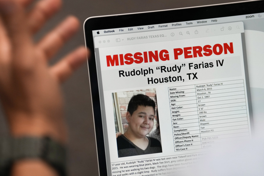 A missing persons flier is displayed on a computer screen as Houston Police Chief Troy Finner gives an update on the Rudy Farias case during a news conference at HPD headquarters, Thursday, July 6, 2023, in Houston. Farias, who was reported missing as a teenager in 2015, returned home the next day but he and his mother deceived officers by giving false names over the ensuing eight years, police said Thursday.
