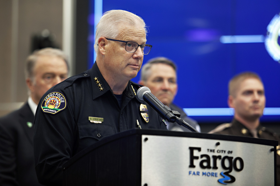 Fargo Police Chief Dave Zibolski pauses during a news conference regarding Friday's shooting, in Fargo, N.D., Saturday, July 15, 2023.  Zibolski said the gunman opened fire on police and firefighters "for no known reason" as they responded to a traffic crash in North Dakota, killing one officer and wounding two others before another officer killed him.