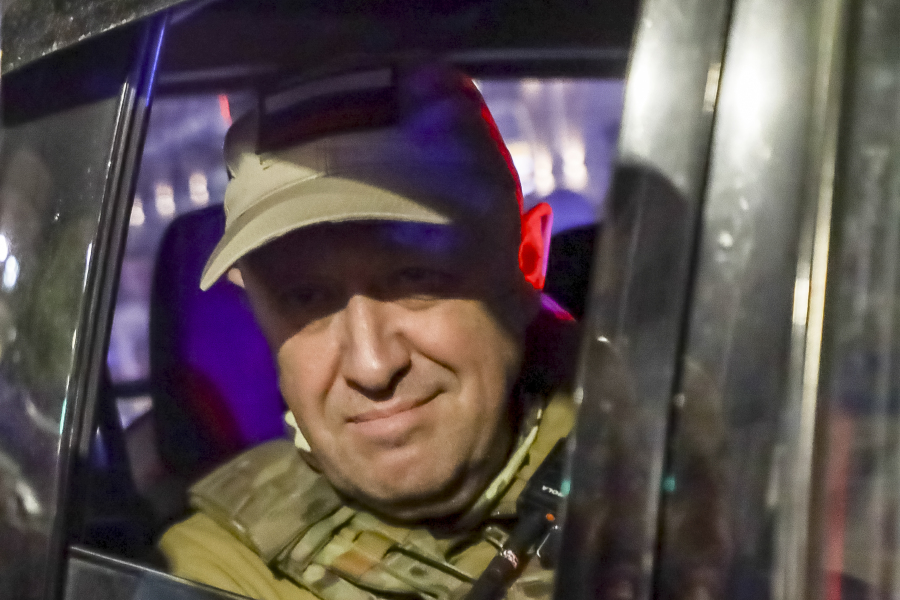 FILE - Yevgeny Prigozhin, the owner of the Wagner Group military company, looks from a military vehicle leaving an area of the HQ of the Southern Military District in a street in Rostov-on-Don, Russia, on June 24, 2023. Putin recounted to Kommersant his own version of a Kremlin event attended by 35 Wagner commanders, including the group's chief, Yevgeny Prigozhin, on June 29. That meeting came just five days after Prigozhin and his troops staged a stunning but short-lived rebellion against Moscow authorities.