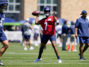 Seattle Seahawks quarterback Geno Smith (7) looks to throw during the NFL football team's training camp, Wednesday, July 26, 2023, in Renton, Wash.