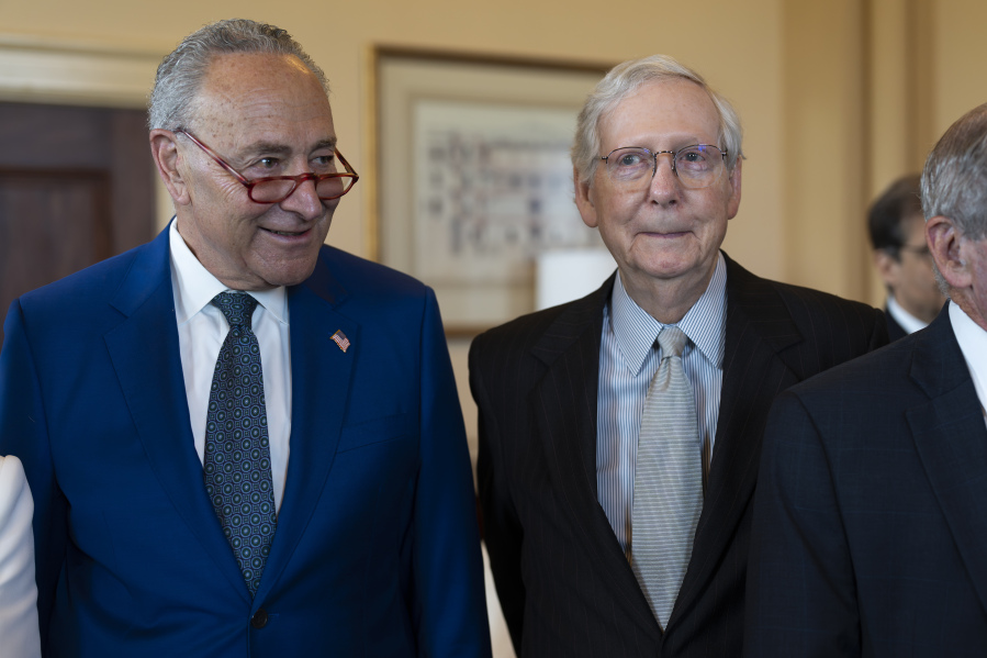 Senate Majority Leader Chuck Schumer, D-N.Y., left, and Senate Minority Leader Mitch McConnell, R-Ky., stand together during a meeting with visiting Italian Prime Minister Giorgia Meloni, at the Capitol in Washington, Thursday, July 27, 2023. Before adjourning for the August recess, the two leaders worked to authorize appropriations for fiscal year 2024 for military activities of the Department of Defense. (AP Photo/J.