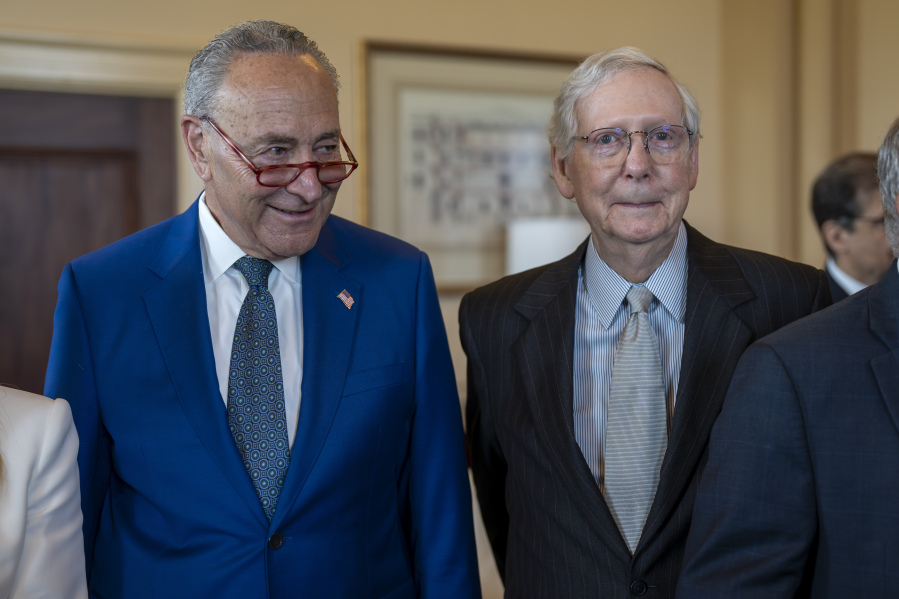 Senate Majority Leader Chuck Schumer, D-N.Y., left, and Senate Minority Leader Mitch McConnell, R-Ky., stand together during a meeting with visiting Italian Prime Minister Giorgia Meloni, at the Capitol in Washington, Thursday, July 27, 2023. Before adjourning for the August recess, the two leaders worked to authorize appropriations for fiscal year 2024 for military activities of the Department of Defense. (AP Photo/J.