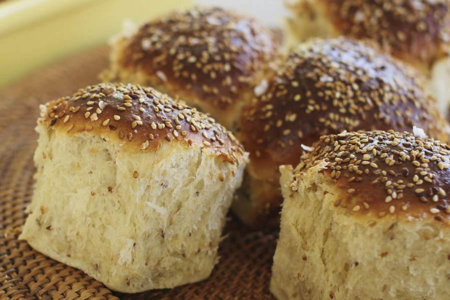 FILE - Sesame dinner rolls sit on a mat in Concord, N.H., on Oct. 12, 2015. Food manufacturers who deliberately add sesame to their products and include it on the labels are not violating a new federal law, the U.S. Food and Drug Administration said Wednesday, July 26, 2023.