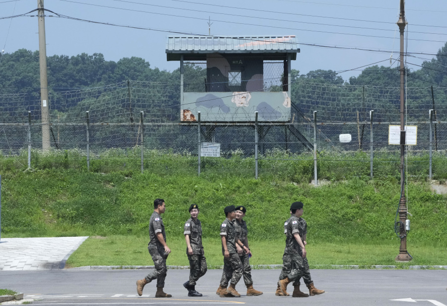 South Korean army soldiers pass by a military guard post at the Imjingak Pavilion in Paju, South Korea, near the border with North Korea, Wednesday, July 19, 2023. North Korea was silent about the highly unusual entry of an American soldier across the Koreas' heavily fortified border although it test-fired short-range missiles Wednesday in its latest weapons display.