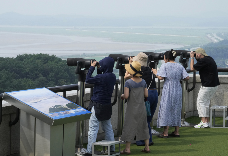 Visitors watch the North Korean side from the Unification Observation Post in Paju, South Korea, Thursday, July 20, 2023. North Korea wasn't responding Thursday to U.S. attempts to discuss the American soldier who bolted across the heavily armed border and whose prospects for a quick release are unclear at a time of high military tensions and inactive communication channels.