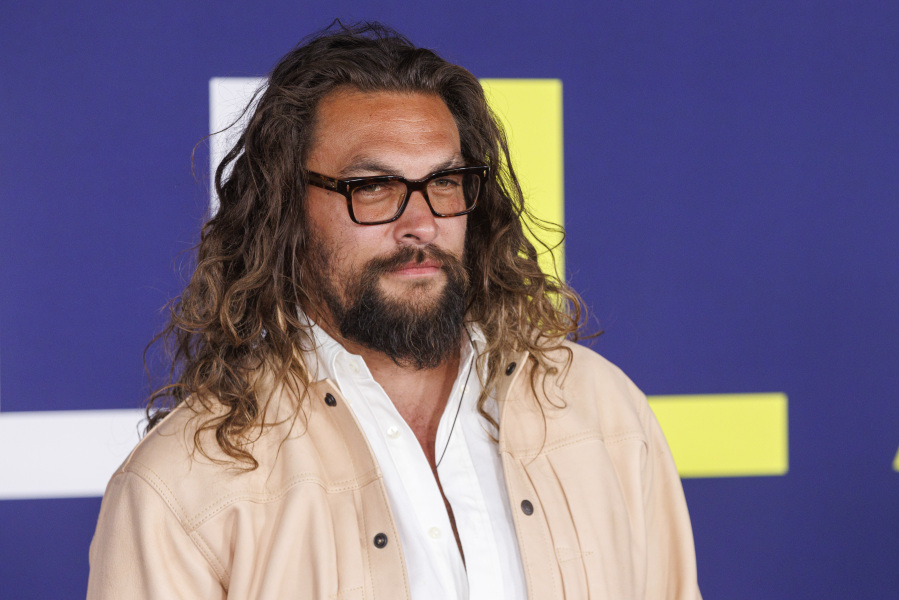 Jason Momoa appears at the premiere of "Ambulance" in Los Angeles on April 4, 2022. Momoa will host Discovery's "Shark Week," premiering Sunday.