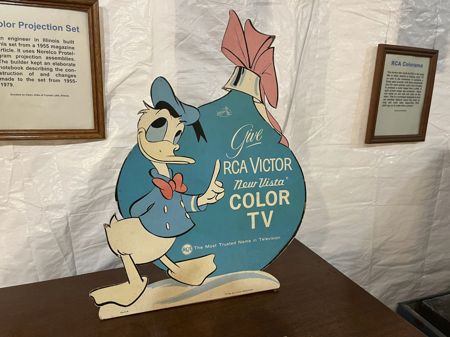 An advertisement featuring Donald Duck appears among the collection of televisions June 4 at the Early Television Museum in Hilliard, Ohio.