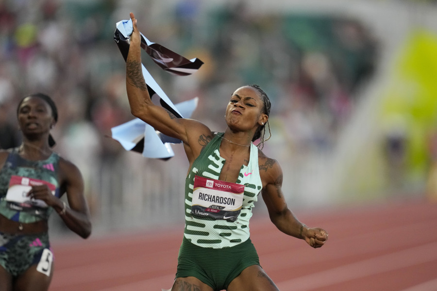 Sha'Carri Richardson reacts after winning the women's 100 meter finals during the U.S. track and field championships in Eugene, Ore., Friday, July 7, 2023.