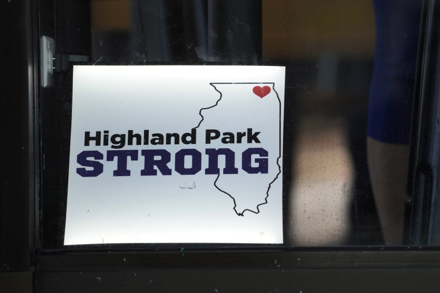 A Highland Park Strong sign is displayed at a restaurant in Highland Park, Ill., Monday, July 3, 2023. One year after a shooter terrorized July Fourth parade-goers in Highland Park, Illinois, community members are planning to gather to honor the seven people who were killed, commemorate the day and reclaim the space to move forward. (AP Photo/Nam Y.