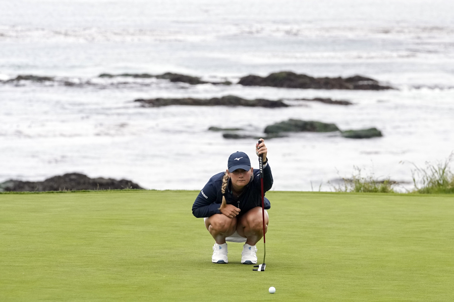 Bailey Tardy measure her putt on the ninth green during the second round of the U.S. Women's Open golf tournament at the Pebble Beach Golf Links, Friday, July 7, 2023, in Pebble Beach, Calif.