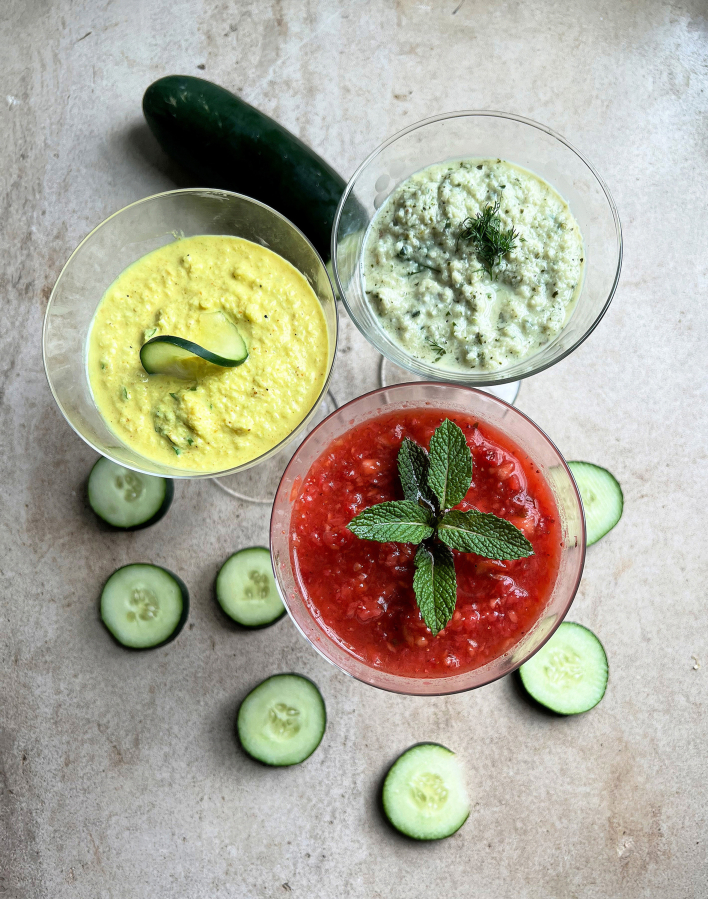 A trio of cold soups with cucumber as a main ingredient. Clockwise from left: Curried Cucumber Soup, Easy Cold Cucumber Soup, Strawberry Gazpacho.