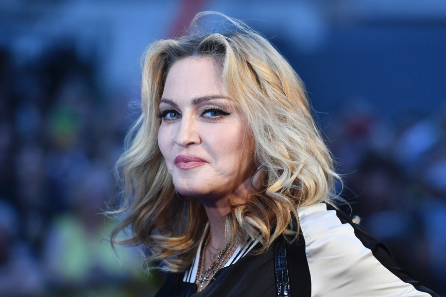U.S. singer-songwriter Madonna poses arriving on the carpet to attend a special screening of the film "The Beatles: Eight Days A Week ??? The Touring Years" in London on Sept. 15, 2016.