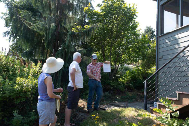 Passing grade: Dan Richardson (right) conducts a Firewise review at the Columbia River Gorge home of Luci Walker and Kevin Widener.
