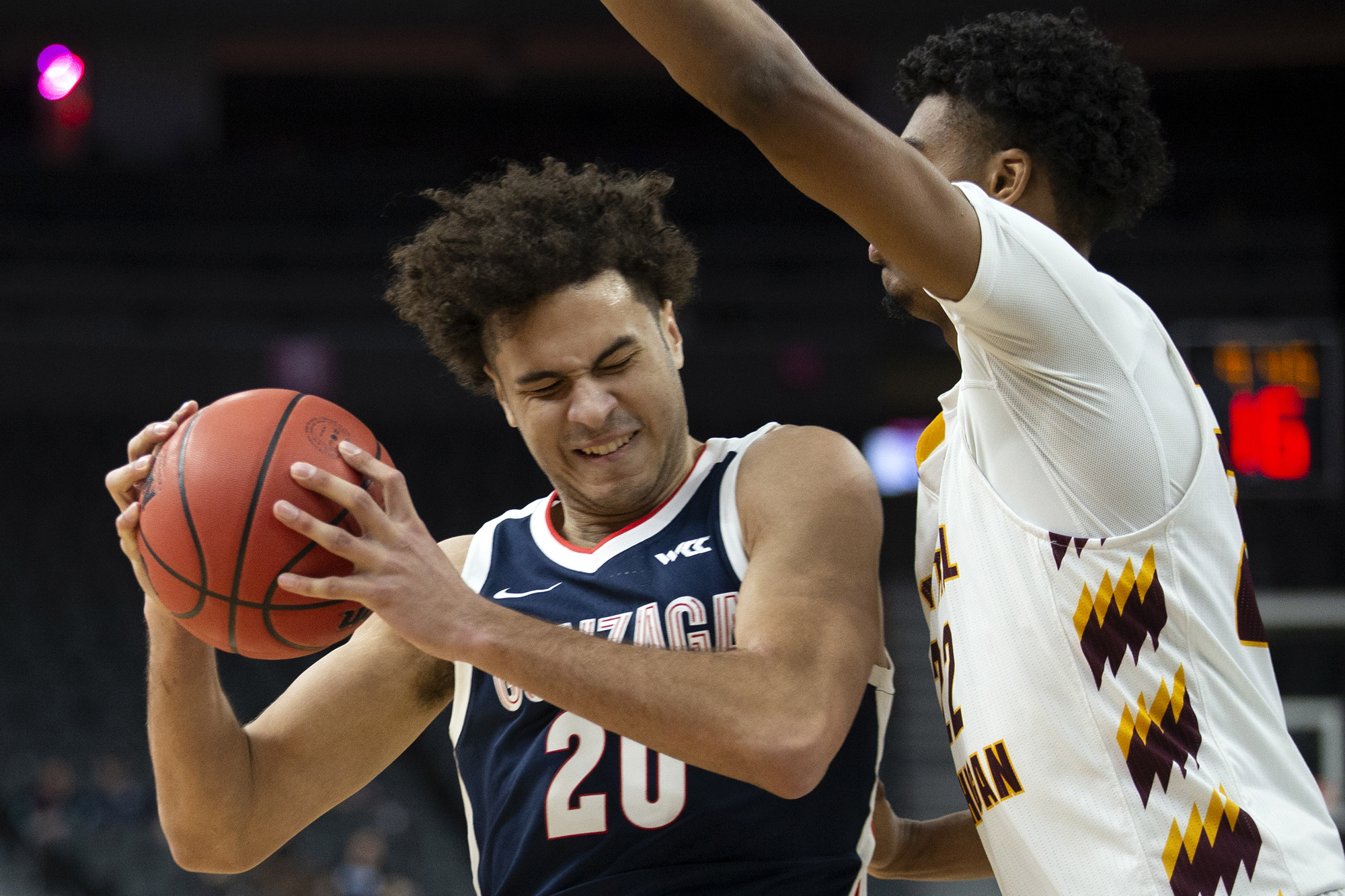 Gonzaga forward Kaden Perry (20) works against Central Michigan center Nicolas Pavrette during the second half of an NCAA college basketball game Monday, Nov. 22, 2021, in Las Vegas.