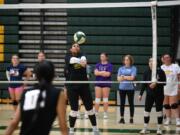 Evergreen volleyball senior Alexis Echols sends the ball over the net during the first day of tryouts on Monday, Aug. 21, 2023, at Evergreen High School.