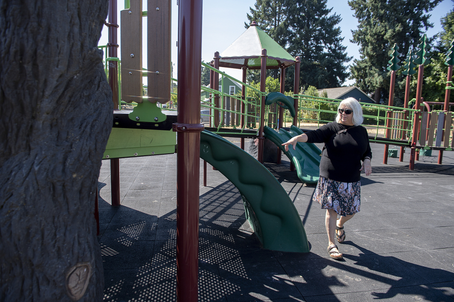 Playground designer Jane Tesner-Kleiner looks over the playground at Hough Elementary School on Wednesday morning. Bond measures in recent years have allowedVancouver Public Schools and Evergreen Public Schools to totally revamp elementary school playgrounds for both accessibility and diversity of options for play.