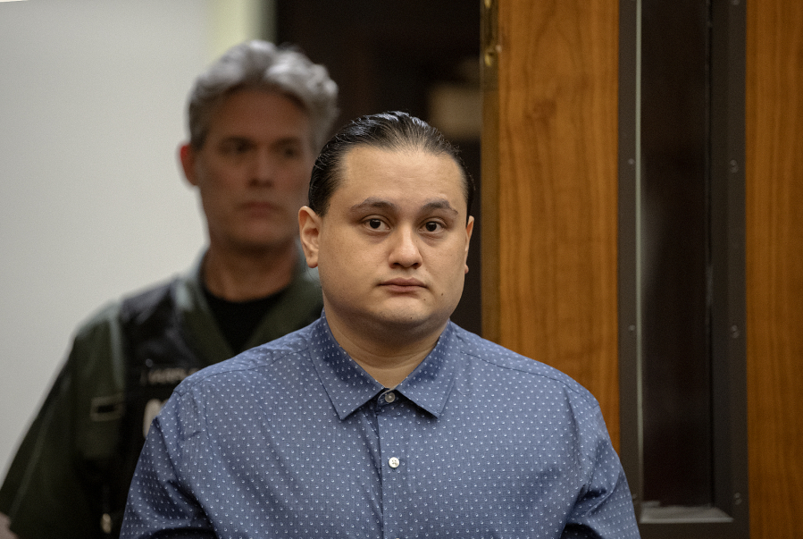 Defendant Abran Raya Leon enters the courtroom Tuesday for his felony murder trial in Clark County Superior Court. He is accused of participating in a firearms trafficking scheme with his wife, Misty Raya, and brother, Guillermo Raya Leon, who allegedly fatally shot Clark County sheriff's Sgt. Jeremy Brown.
