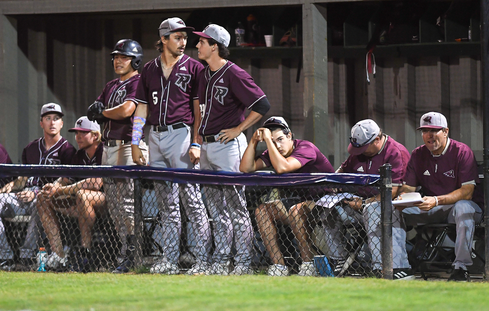 Ridgefield players react during a big inning by the Portland Pickles on Tuesday, Aug. 8, 2023, during the Raptors’ 10-6 loss to the Pickles in the first game of the WCL Divisional Series at Walker Stadium in Portland.