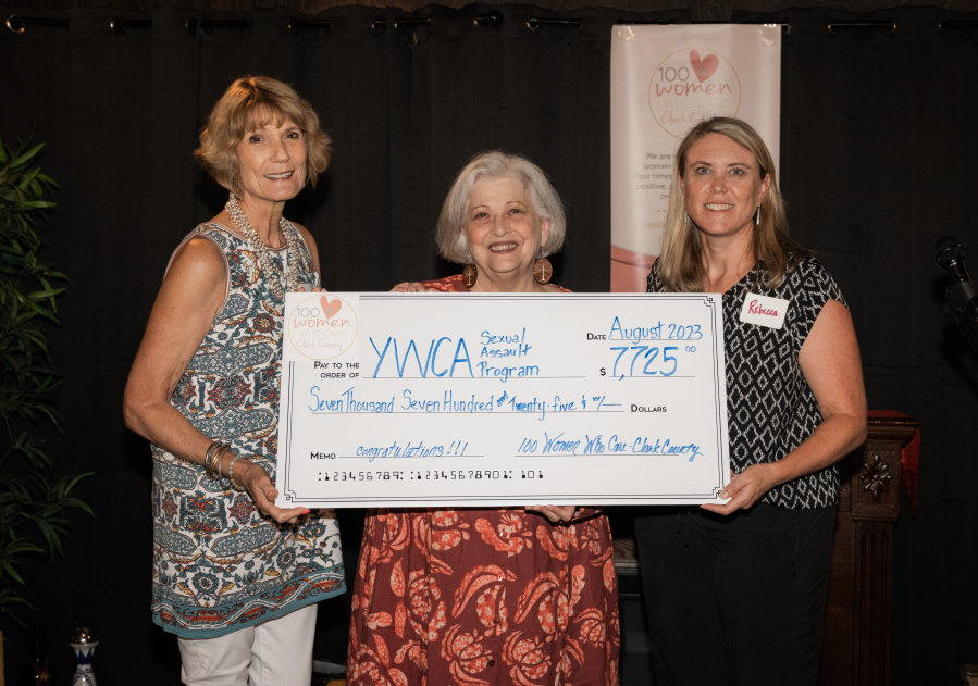 Members of 100 Women Who Care Clark County presented $7,725 to the YWCA- Sexual Assault Program on Aug. 9.