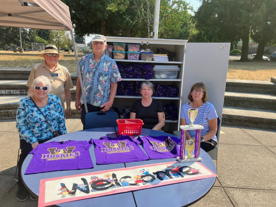 Fort Vancouver Lions Club members congregated on the playground of Washington Elementary school to participate in the annual Back to School Night.