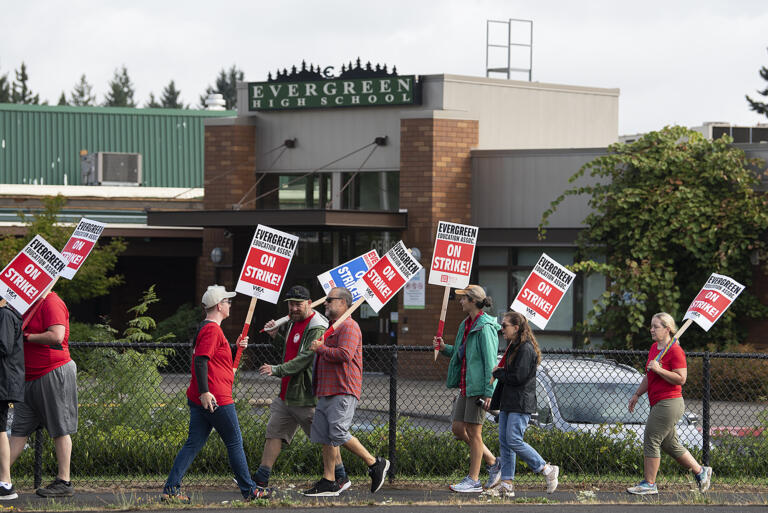 Members of the Evergreen Education Association picket outside Evergreen High School on Wednesday morning, Aug. 30, 2023.