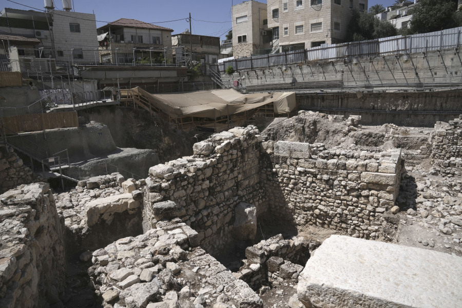 ADDS CONTEXT - The site of a discovery unveiled by Israel's Antiquities Authority in the City of David National Park near the Old City of Jerusalem, Wednesday, Aug. 30, 2023. Archaeologists described the discovery as ancient "channels" likely used to soak products around 2,800 years ago during the First Temple Period, though they said their exact purpose is unclear. The City of David contains some of the oldest remains of the 3,000-year-old city, the spiritual center of Judaism. But critics accuse the site's operators, who are linked to a Jewish settler group, of pushing a nationalistic agenda at the expense of local Palestinian residents in east Jerusalem - the area of the city captured by Israel in 1967 and claimed by the Palestinians as their would-be capital.