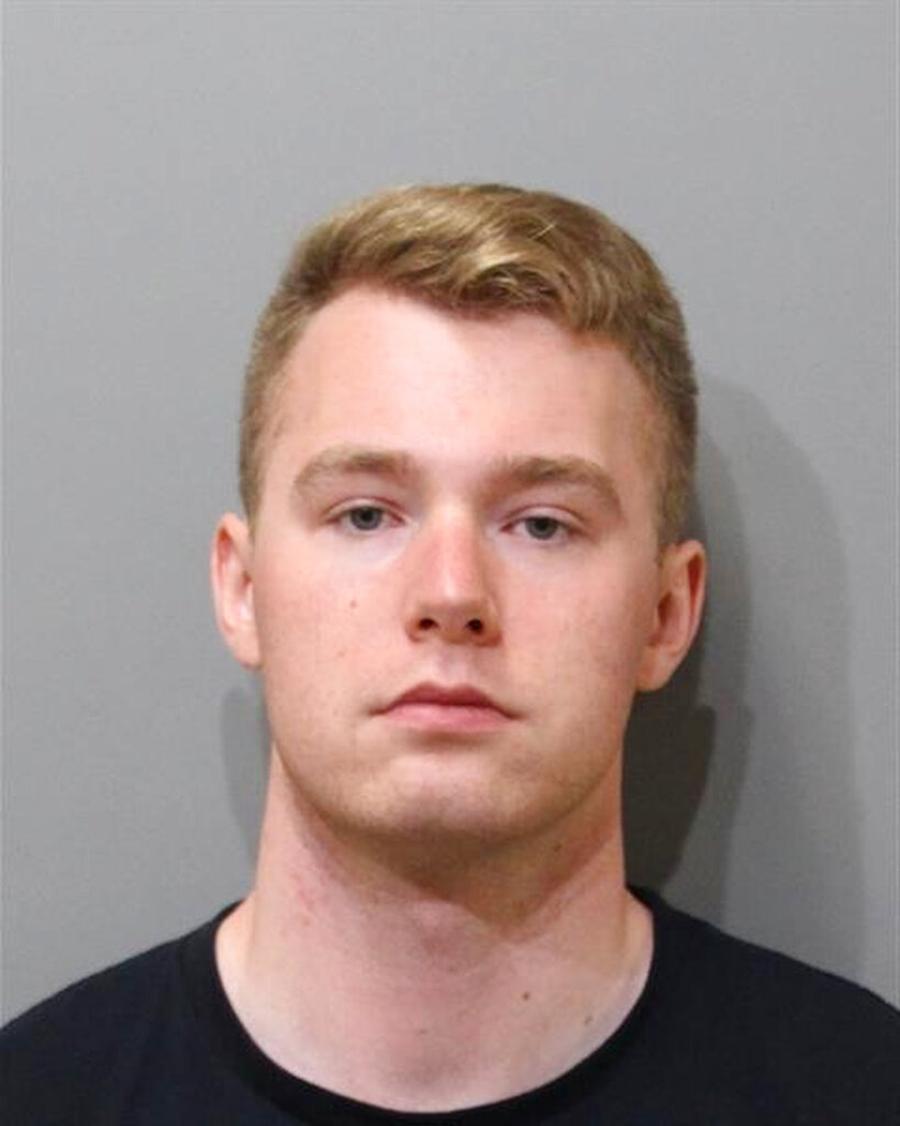 This booking image provided by the Kootenai County Sheriff's Office shows Colton Brown, who was arrested on June 11, 2022 in downtown Coeur d' Alene, Idaho. Authorities arrested Brown, along with other members of the white supremacist group Patriot Front near an LGBTQ pride event Saturday, after they were found packed into the back of a U-Haul truck with riot gear.