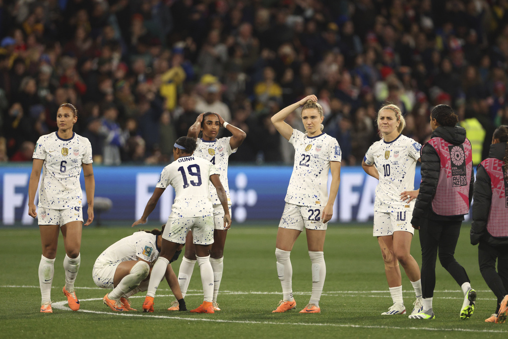United States' players react after losing their Women's World Cup round of 16 soccer match against Sweden in a penalty shootout in Melbourne, Australia, Sunday, Aug. 6, 2023.