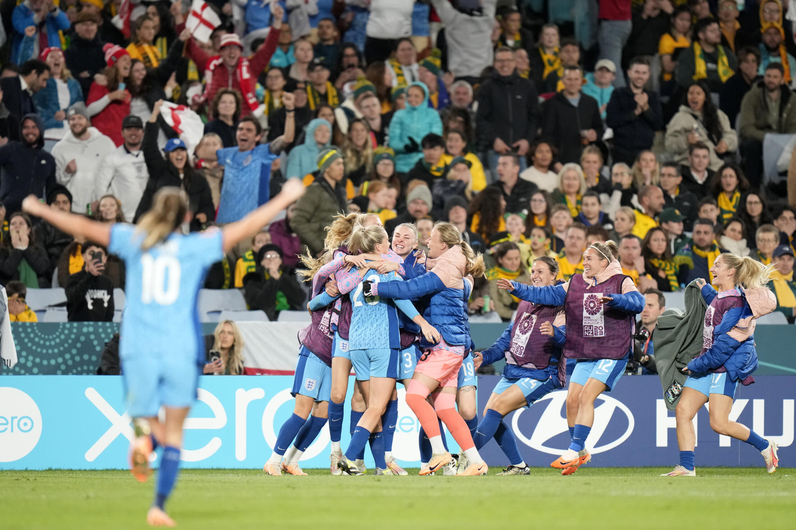 England players celebrate after England's Alessia Russo scored her side's third goal during the Women's World Cup semifinal soccer match between Australia and England at Stadium Australia in Sydney, Australia, Wednesday, Aug. 16, 2023.