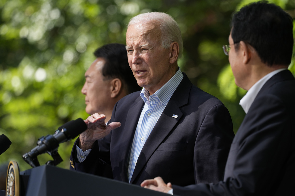 President Joe Biden, center, stands with South Korean President Yoon Suk Yeol, left, and Japanese Prime Minister Fumio Kishida, during a joint news conference Friday, Aug. 18, 2023, at Camp David, the presidential retreat, near Thurmont, Md.