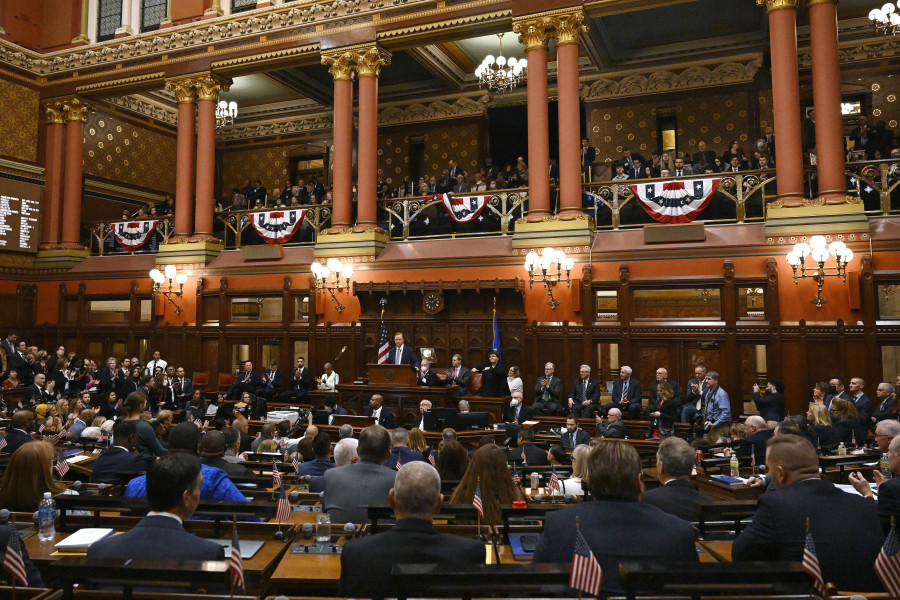 FILE -- Connecticut Gov. Ned Lamont delivers the State of the State address during opening session of the Legislature, at the State Capitol, Jan. 4, 2023, in Hartford, Conn. Lawmakers in Connecticut, Wednesday, July 19, 2023, passed a bill that places new controls on state government's use of artificial intelligence.