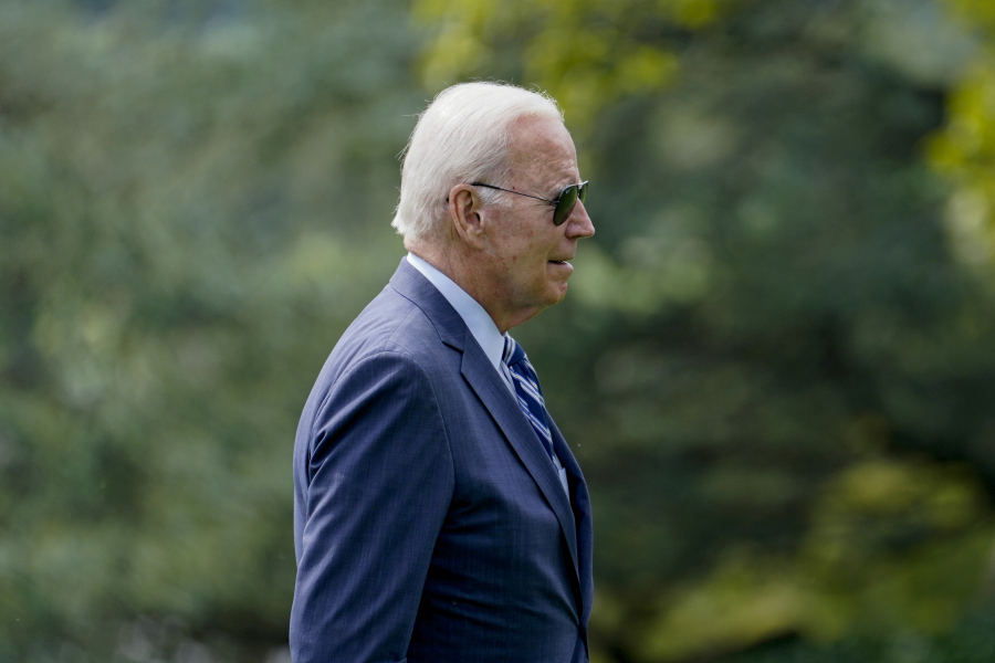 President Joe Biden walks towards the Oval Office after arriving on Marine One on the South Lawn of the White House, Monday, Aug. 14, 2023, in Washington.