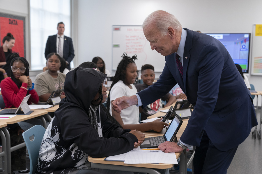 President Joe Biden greets students at Eliot-Hine Middle School in Washington, Monday, Aug. 28, 2023. Biden visited the school, located east of the U.S. Capitol, to mark the District of Columbia's first day of school for the 2023-24 year.