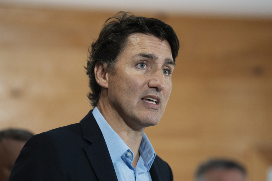 Canadian Prime Minister Justin Trudeau speaks to reporters following an announcement at the Island Montessori Academy in Cornwall, Prince Edward Island, Monday, Aug. 21, 2023.