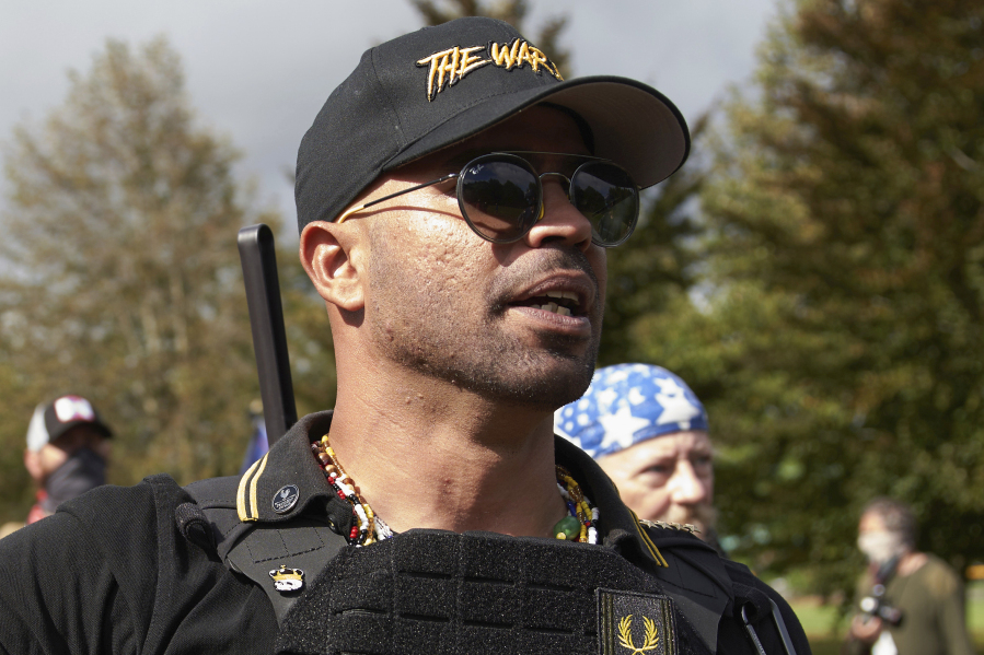 FILE - Proud Boys leader Enrique Tarrio speaks at a rally in Delta Park on Sept. 26, 2020, in Portland, Ore.